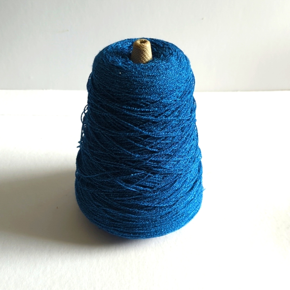 Big spool of blue thread/yarn